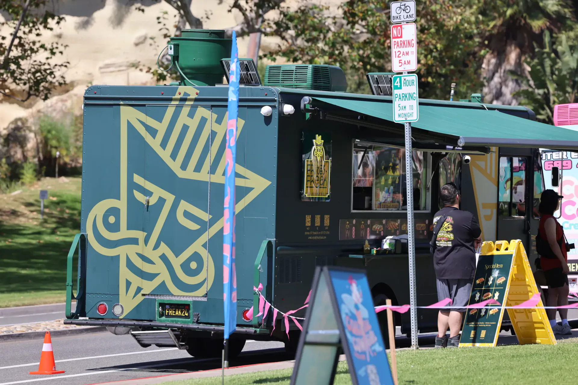 The FRitēS-FReaK truck parked and serving at a park event